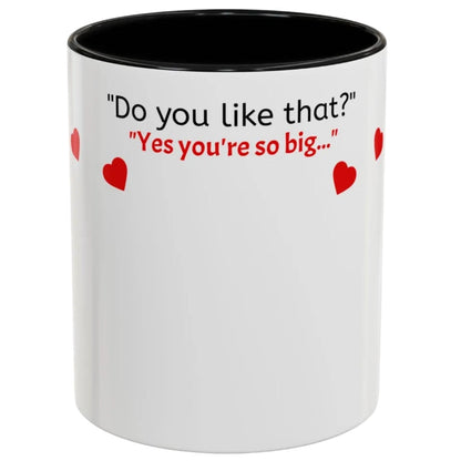 White mug with black interior, text, and red hearts on a white background